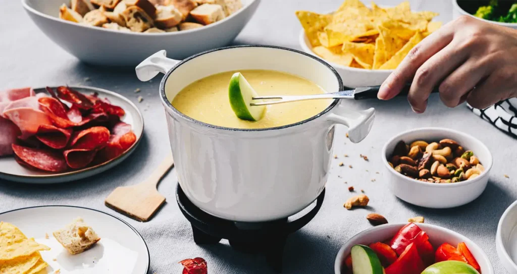 Cheese fondue with easy sides and bites